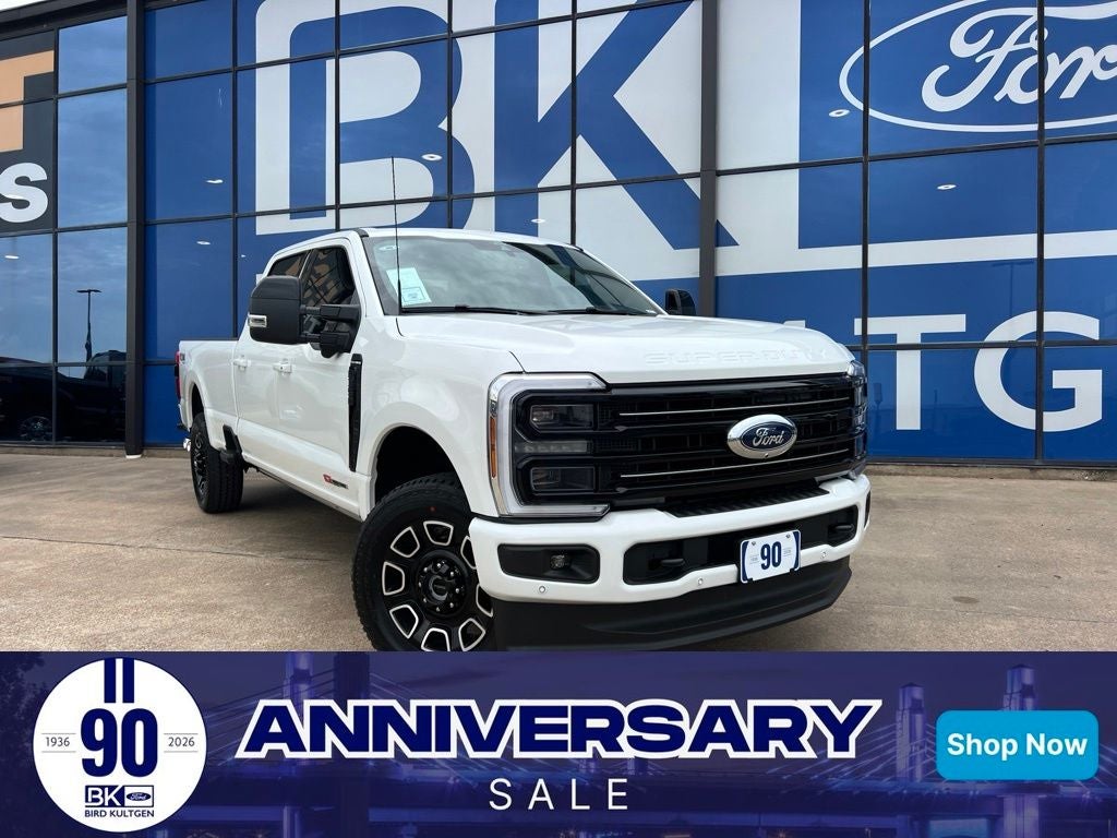 2026 Ford Super Duty F-350SD Platinum in Star White Metallic Tri-Coat — front three-quarter view